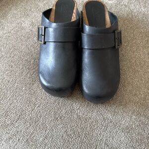Black Leather Slip-On Clogs with Buckle Detail
